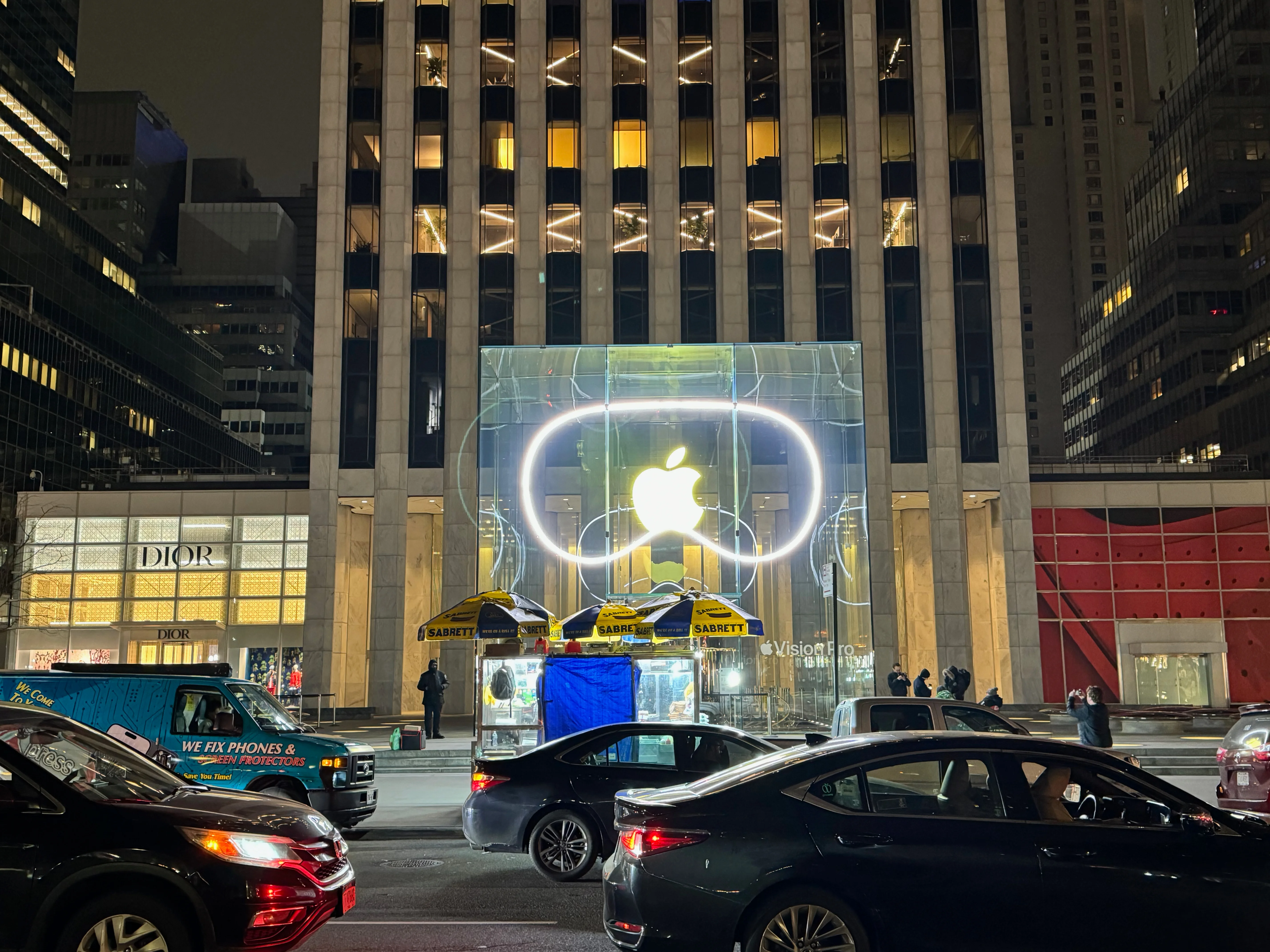 The glass cube entrance at Apple Fifth Avenue at night