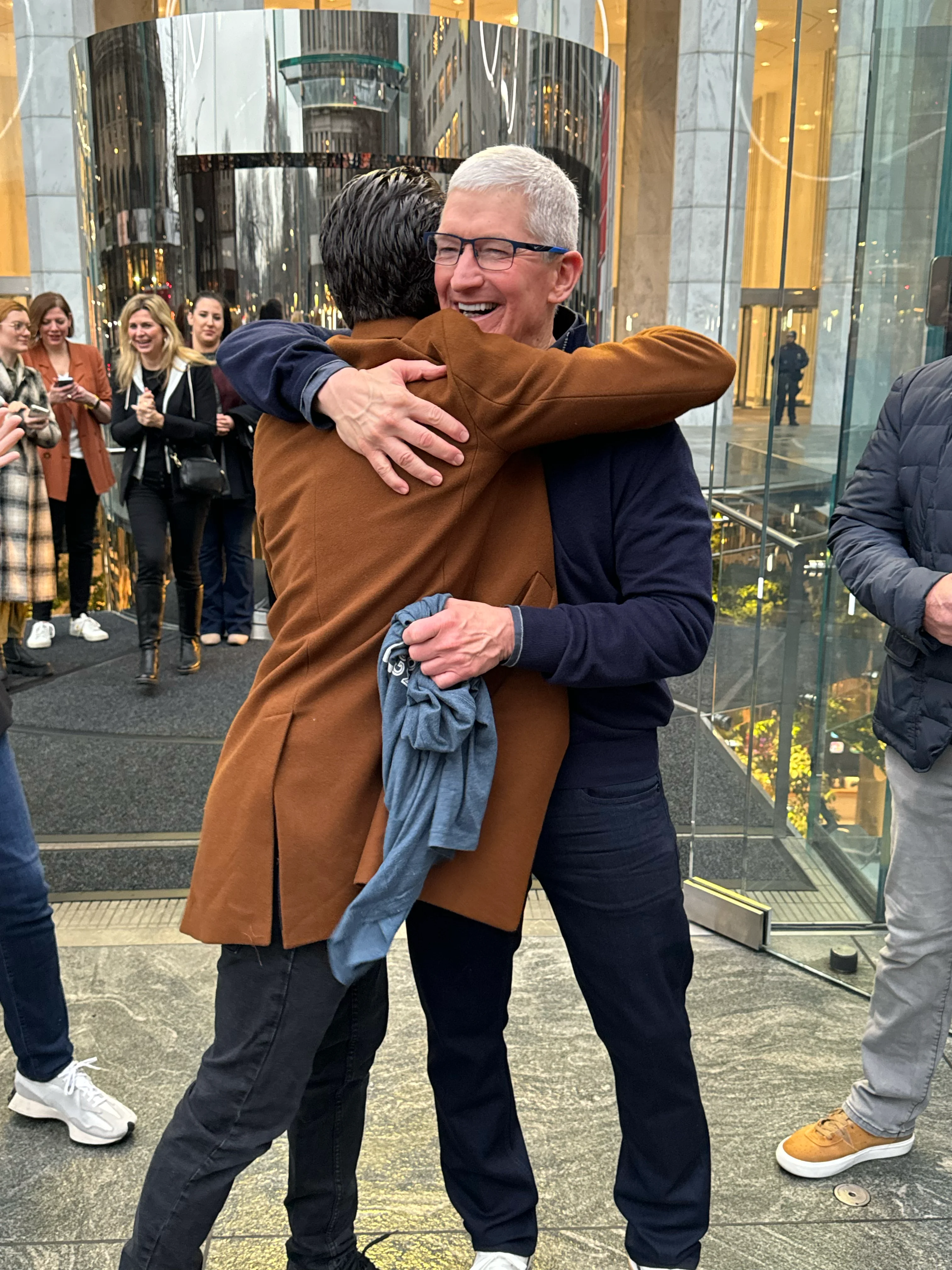 Handing Tim Cook the t-shirt